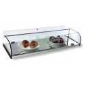 Vitrina neutra cerrada de cristal curvo